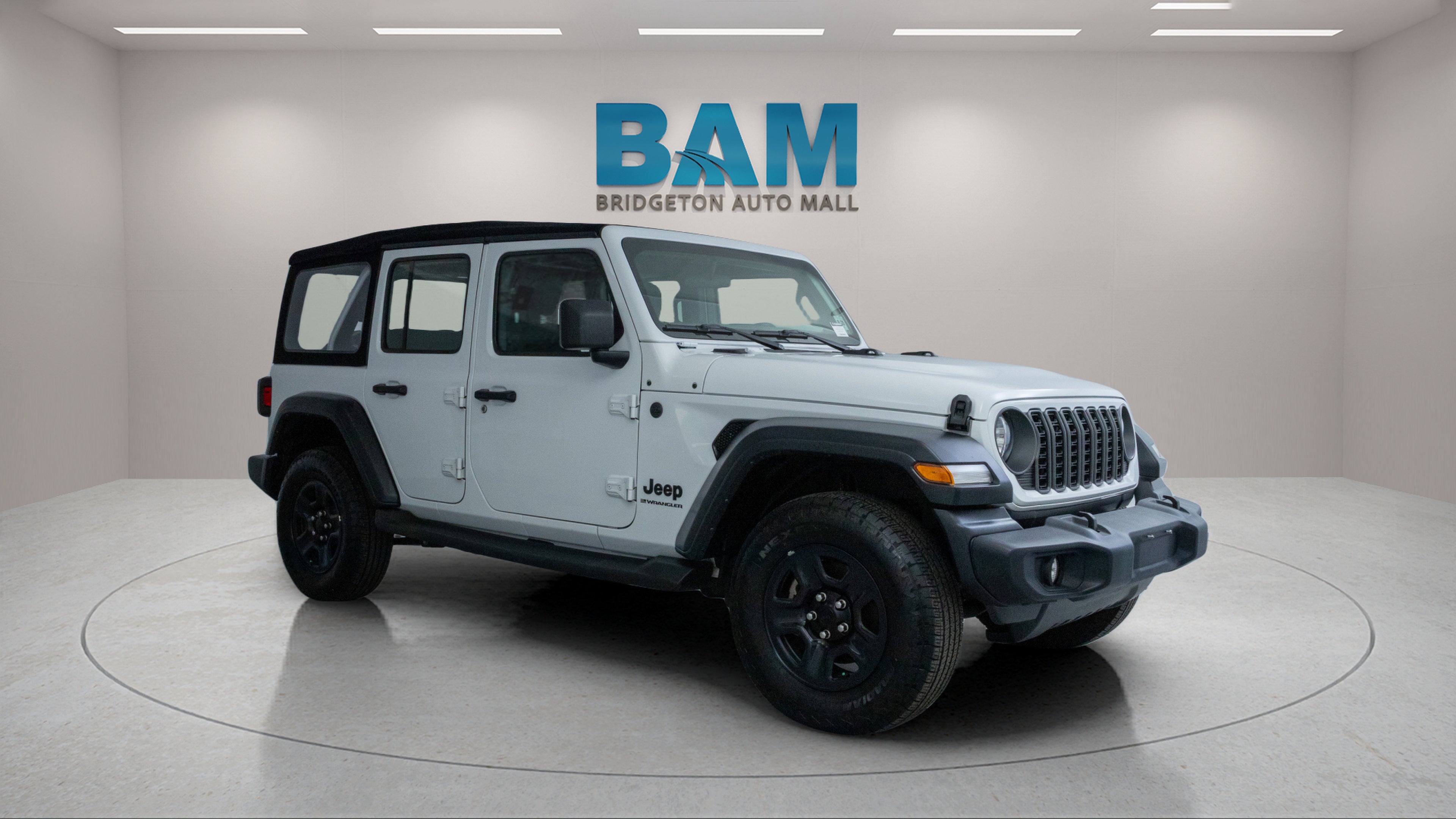 2024 Jeep Wrangler 4-Door Sport 4x4 in Bright White Clearcoat — front three-quarter view