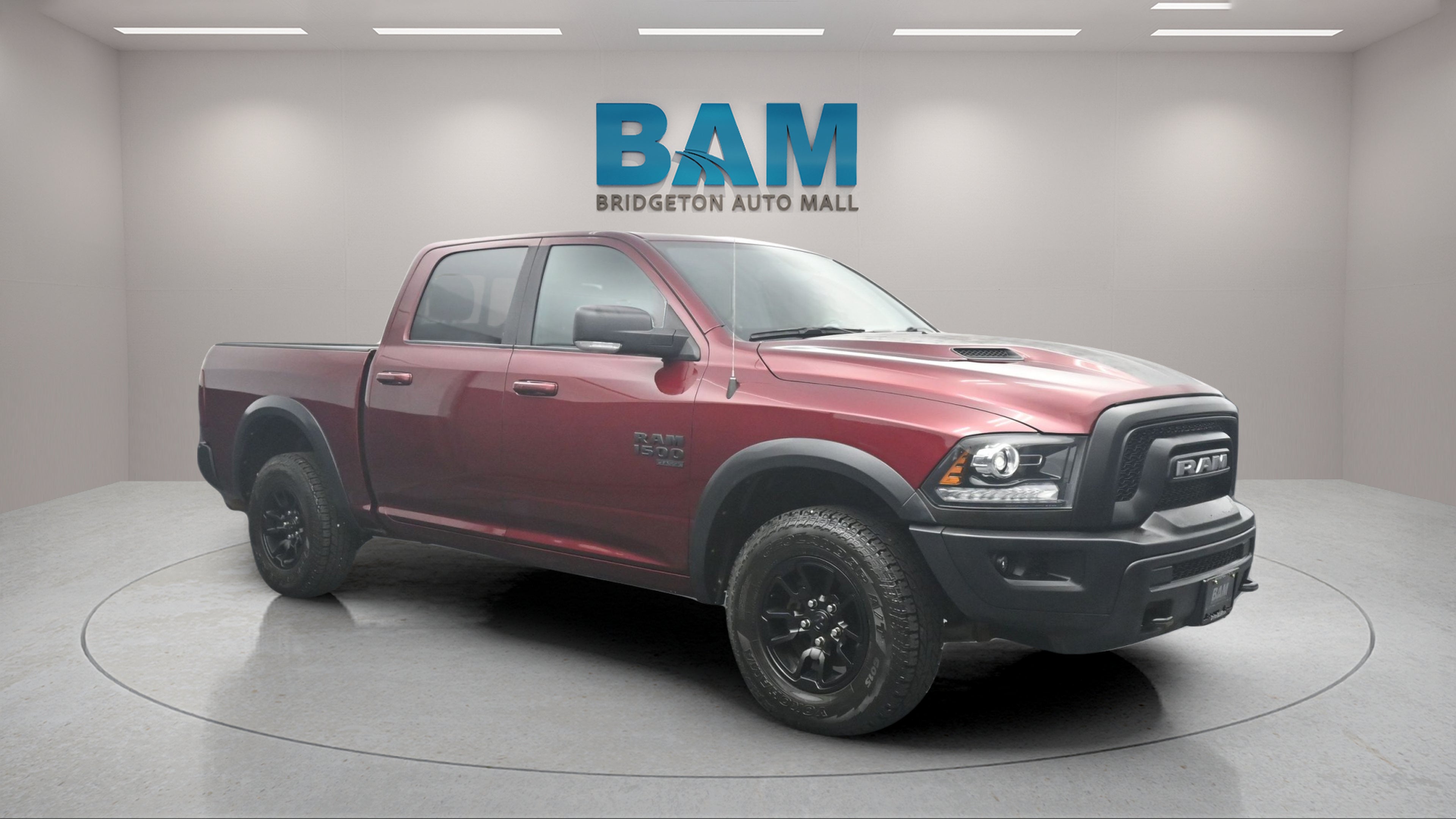 2021 RAM 1500 Classic SLT in Delmonico Red Pearlcoat — front three-quarter view