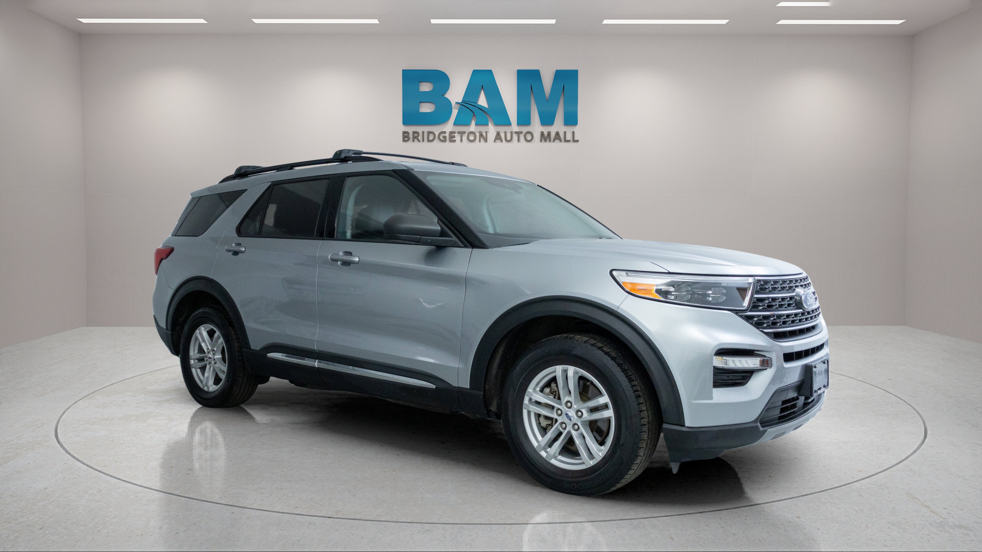 2023 Ford Explorer XLT in Iconic Silver Metallic — front three-quarter view