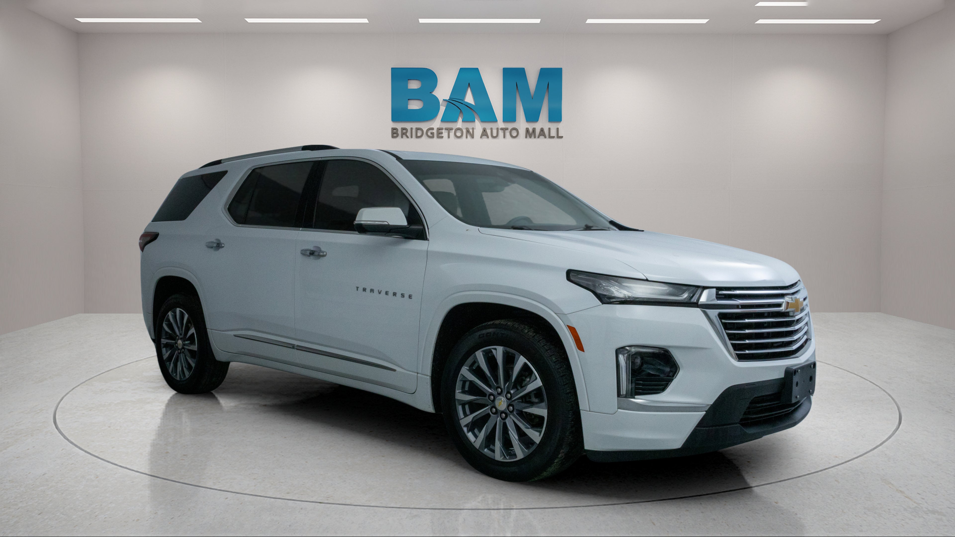 2023 Chevrolet Traverse AWD Premier in Summit White — front three-quarter view