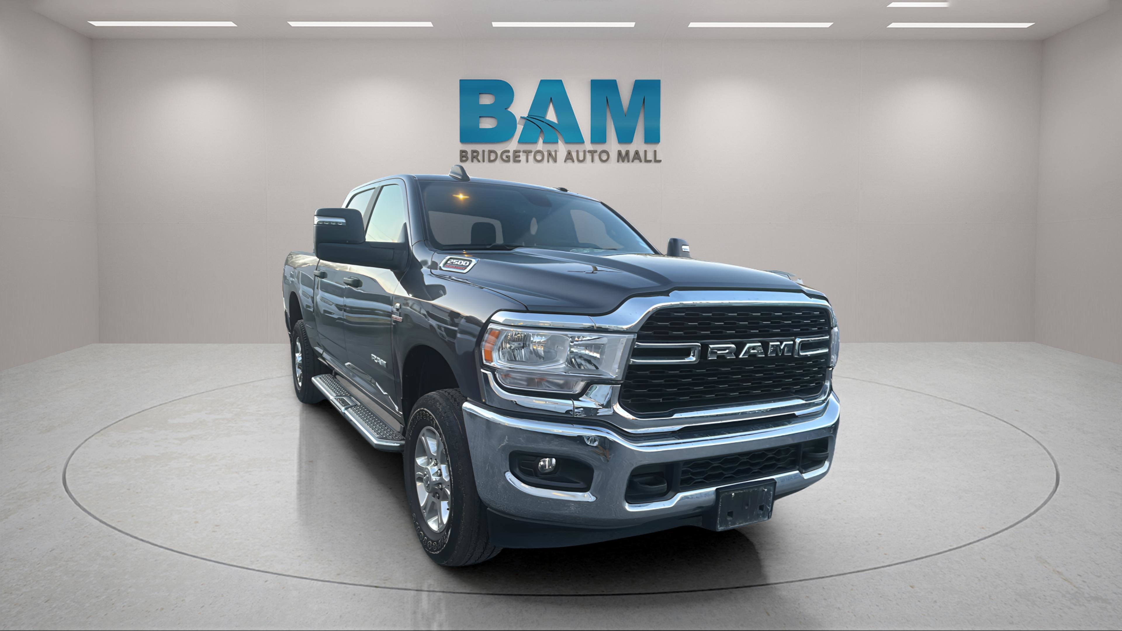 2024 RAM 2500 Big Horn Crew Cab 4x4 6'4' Box in Granite Crystal Metallic Clearcoat — front three-quarter view
