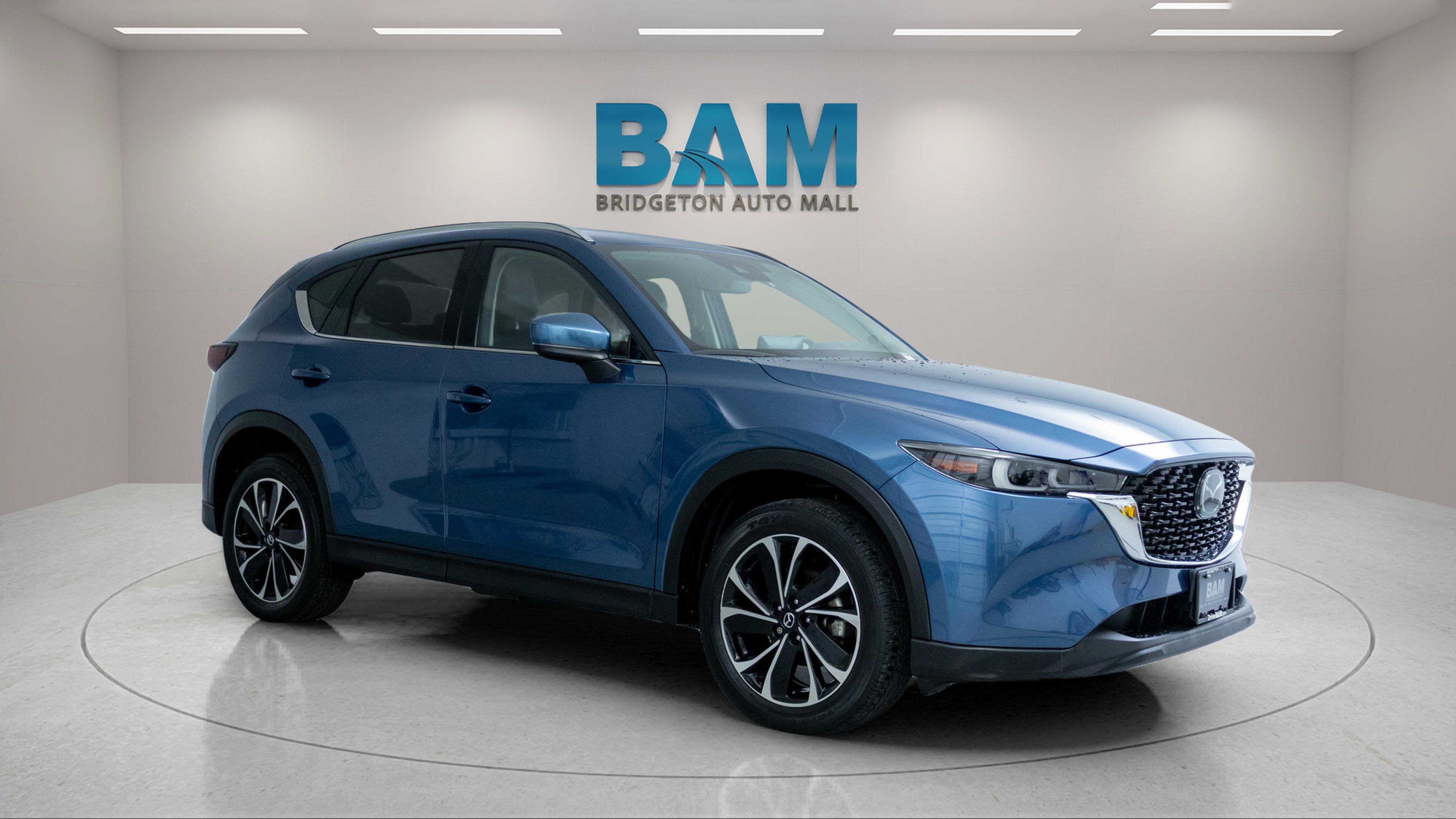 2023 Mazda Mazda CX-5 2.5 S Premium Plus in Eternal Blue Mica — front three-quarter view