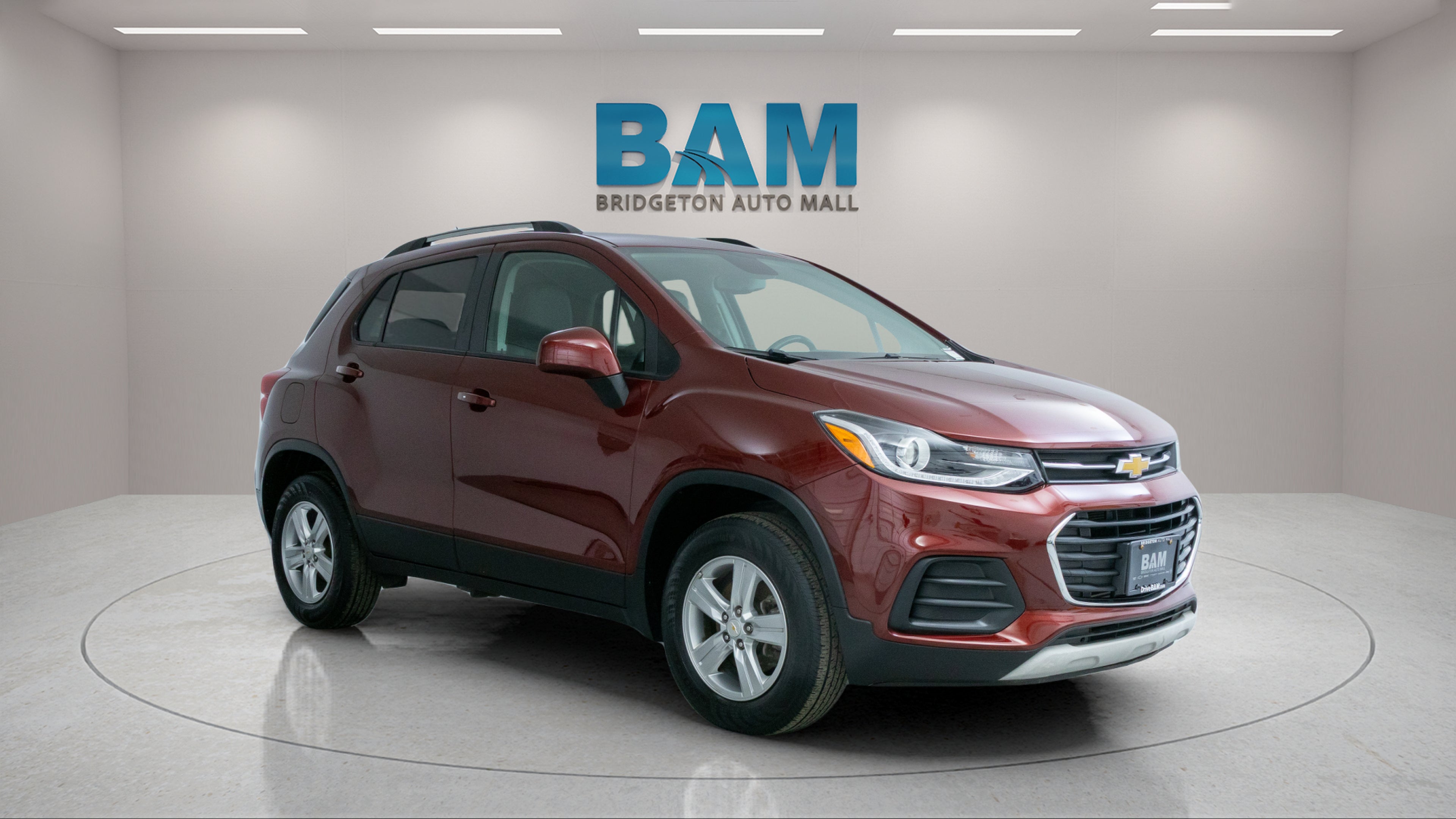 2022 Chevrolet Trax AWD LT in Crimson Metallic — front three-quarter view